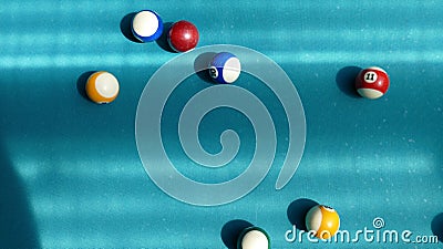 Billiard table with multi-colored balls Stock Photo