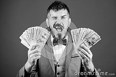 Billioner with dollar banknotes. Business and sport success. winning a lottery. businessman after great deal. Finance Stock Photo