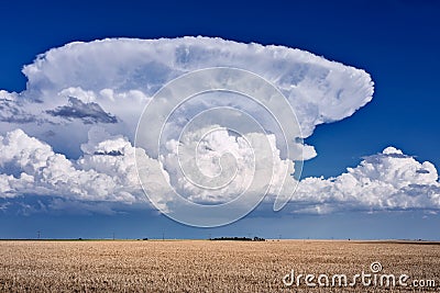 Thunderstorm cumulonimbus clouds with blue sky Stock Photo
