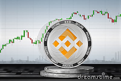 Binance Coin BNB cryptocurrency; Binance coin on the background of the chart Editorial Stock Photo