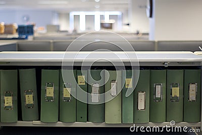 Binders in cubicle Stock Photo