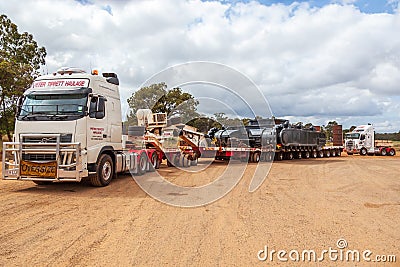 BINDOON, AUSTRALIA - Oct 13, 2012: Oversize loads of mining machinery are transported by truck to the iron ore mines in the Editorial Stock Photo