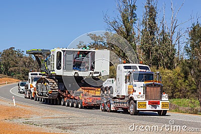 BINDOON, AUSTRALIA - Sep 15, 2012: Oversize loads of mining machinery are transported by truck to the iron ore mines in the Editorial Stock Photo