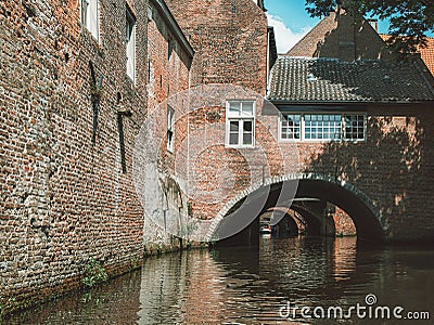 The Binnendieze is a small river that is enclosed within the Den Bosch city and therefore runs mostly underground Stock Photo