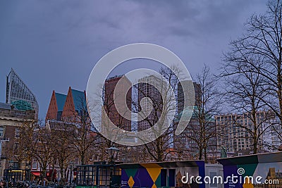 Binnenhof castle (Dutch Parliament) with the Hofvijver lake against a background of skyscrapers Editorial Stock Photo