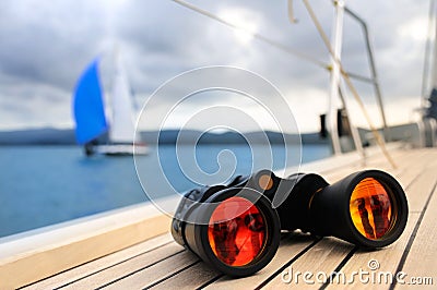 Binocular on the deck of yacht Stock Photo