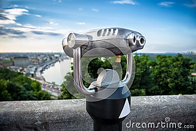 Binocular next to the waterside promenade Stock Photo