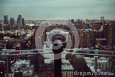 Binocular on the rooftop balcony with the view to New York City streets Stock Photo