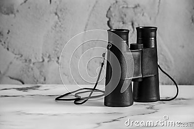 Binoculars allows the viewer to use both eyes (binocular vision) to view distant objects Stock Photo