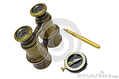 Binoculars, compass and pen Stock Photo