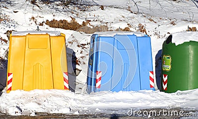 Bins for waste paper and used glass bottles Stock Photo