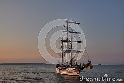 Binz, Germany - July 22, 2021 - The Loth LoriÃ«n is a three-masted barquentine flying the Dutch flag at dusk Editorial Stock Photo