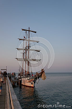 Binz, Germany - July 22, 2021 - The Loth LoriÃ«n is a three-masted barquentine flying the Dutch flag at dusk Stock Photo