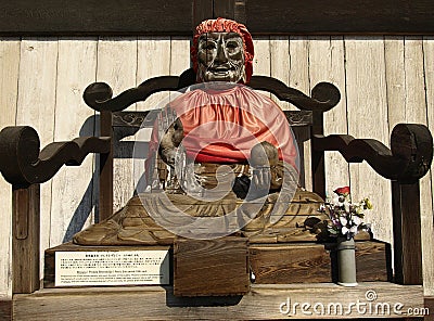 Binzuru Pindola wooden statue Stock Photo