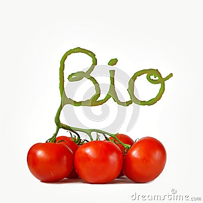 Bio Fresh tomatoes isolated on white with stem shaped inscription bio Stock Photo