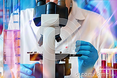 Microscopist working with biological samples in the microscope of the microbiology laboratory Stock Photo