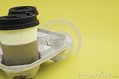 Biodegradable recycled cardboard cup tray for four drinks with cardboard cups for hot drinks Stock Photo