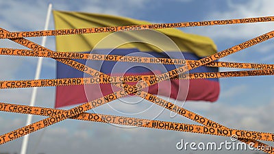 Do not cross biohazard tape lines on the Colombian flag background. Restricted entry or quarantine in Colombia Stock Photo