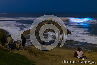 Bioluminescent tide glows behind Windansea surf shack in La Jolla Editorial Stock Photo