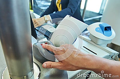 Biometric control of fingerprints in airport. Stock Photo