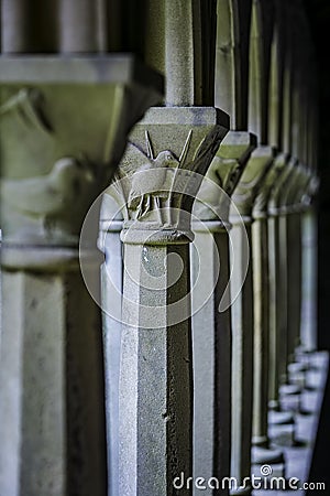 Bird Detail on Vertical Column at Iona Abbey Courtyard Stock Photo