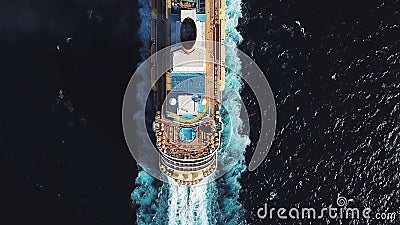 Bird eye top view of large cruiser ship in deep blue water in a sunny day, luxury concept. Stock. Aerial view of luxury Stock Photo