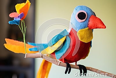 bird puppet made of colorful felt Stock Photo