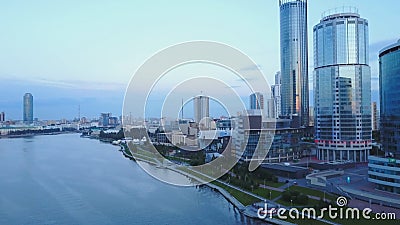 Bird`s eye view of city, modern buildings, city river. Beautiful city aerial view. Large modern city center viewed from Stock Photo