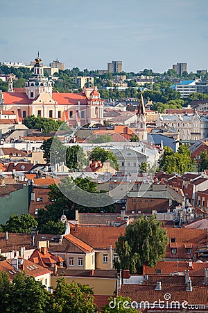Bird`s eye view of Vilnius, Lithuania. Red roofs of churches in old town Stock Photo