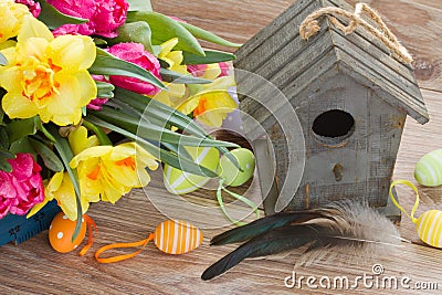 Birdcage with spring flowers Stock Photo