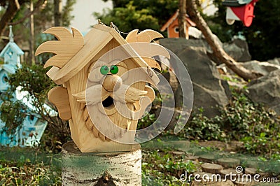 Birdhouse in the form of a grandfather Stock Photo