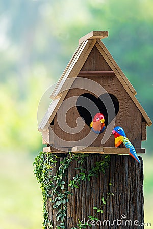 Birdhouse have a heart-shaped entrance Stock Photo