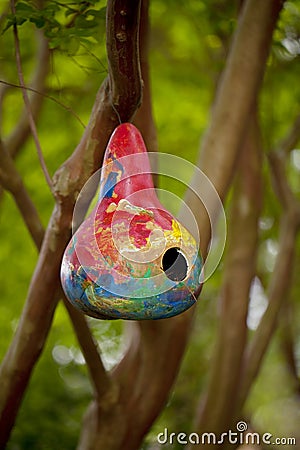 Birdhouse made from painted gourd Stock Photo