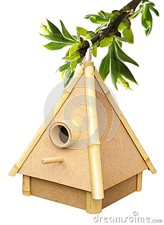 Birdhouse on sprig Stock Photo