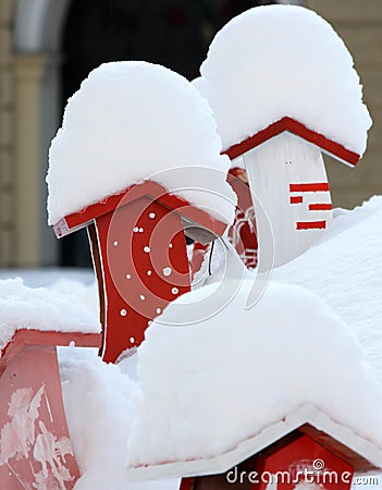 Birds home in the snow Stock Photo