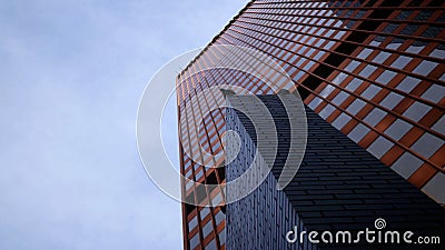 Birds on Perch under Red Skyscraper Stock Photo