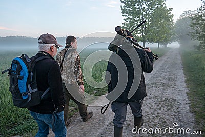 Birdwatchers with guide, on their way to the Bialowieza forest in eastern Poland. Editorial Stock Photo