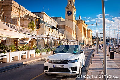 Birgu, Malta - January 10, 2019: Luxury Range Rover parked at the marina in Birgu, Malta. Range Rover is a full-sized luxury sport Editorial Stock Photo