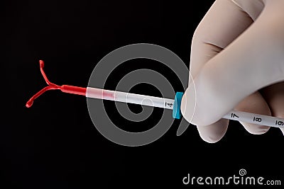 Birth Control symbol, IUD contraception, Sex education with responsability Stock Photo