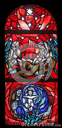 Birth of Jesus, Christmas, stained glass window in St. James church in Hohenberg, Germany Editorial Stock Photo