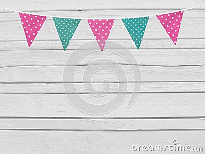 Birthday or baby shower mockup scene. String of pink and mint dotted fabric flags. Party decoration. Old white wooden Stock Photo