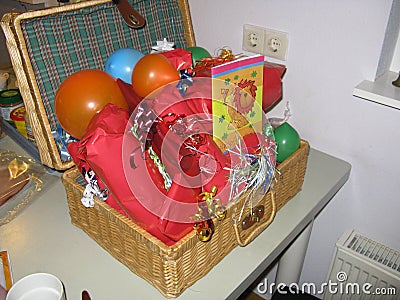 A birthday basket filled with presents Stock Photo