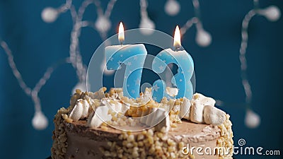 Birthday cake with 73 number candle on blue backgraund. Candles blow out Stock Photo