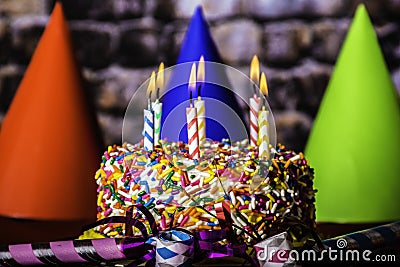 Burning Candles on Birthday Cake Stock Photo