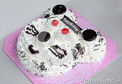 Birthday Cake in white bear head shape on gray box background Stock Photo