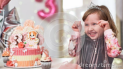 Birthday cake for 3 years decorated with butterflies, gingerbread kitten with icing and the number three. meringue pale pink in Stock Photo