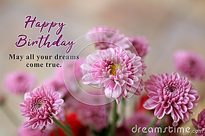 Birthday card and greeting concept. With birthday wishes message - May all your dreams come true. On background of pink flowers. Stock Photo