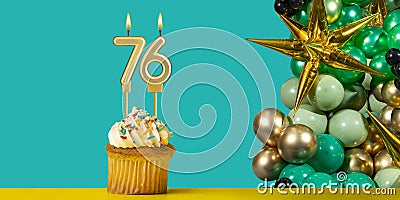 Birthday card number 76 - Cupcake with balloons Stock Photo