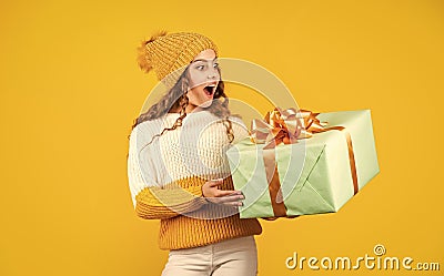 Birthday girl. Happy holidays. Xmas gift shopping. Gift package. Cherished dreams. Boxing day. Teen girl hold gift box Stock Photo