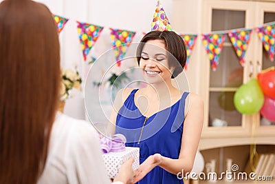 Birthday girl receiving presents Stock Photo